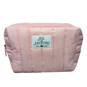 New Sol De Janeiro TSA-approved quilted travel pouch in pink